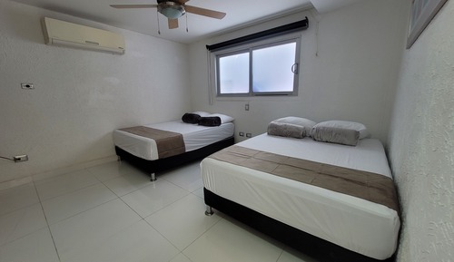 Habitación familiar, varias camas