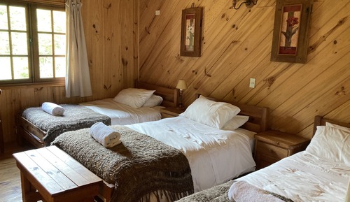 Habitación superior, varias camas