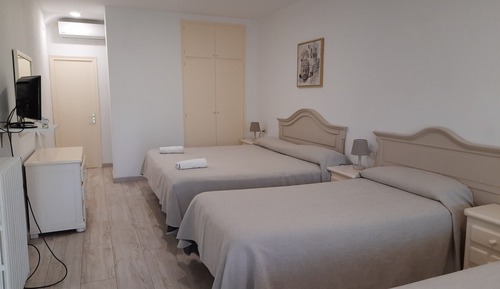 Habitación cuádruple familiar, vistas al jardín, planta baja