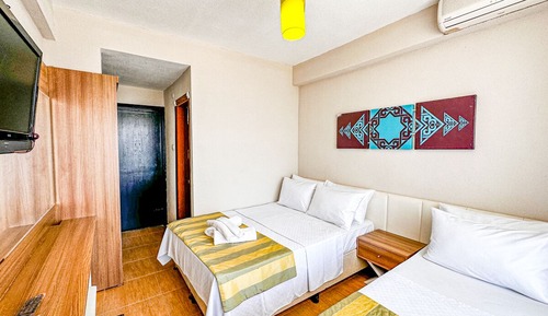 Habitación triple Deluxe, vistas al mar