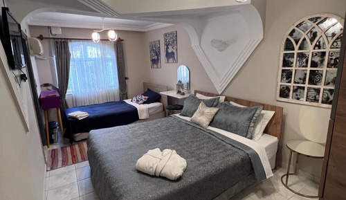 Habitación superior, varias camas