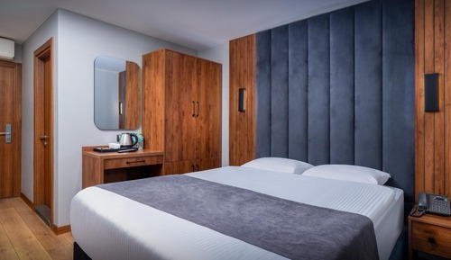 Habitación estándar con 1 cama doble o 2 individuales