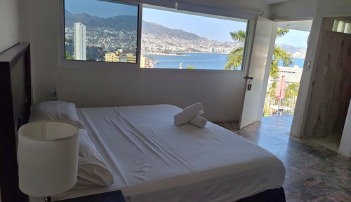 Habitación Deluxe, 1 cama de matrimonio grande con sofá cama, Aire acondicionado, vistas al mar