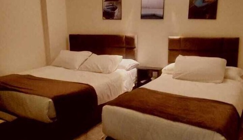 Habitación triple básica, varias camas