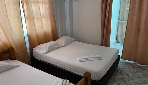 Habitación familiar, varias camas