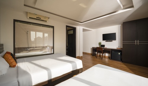Habitación triple Deluxe, balcón, vistas a la ciudad