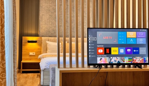 Habitación Deluxe, 1 cama de matrimonio con sofá cama, no fumadores, vistas a la ciudad