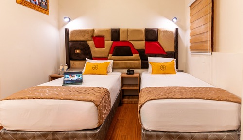 Habitación familiar doble, varias camas