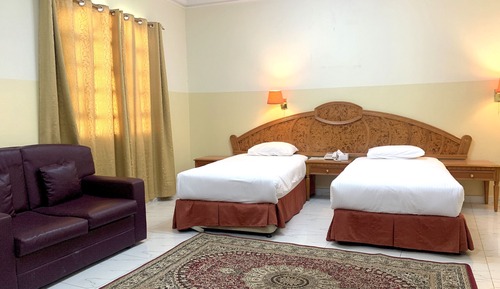Habitación estándar con 1 cama doble o 2 individuales