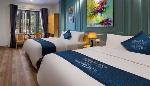Habitación cuádruple Premier, 2 camas de matrimonio, vistas parciales al mar