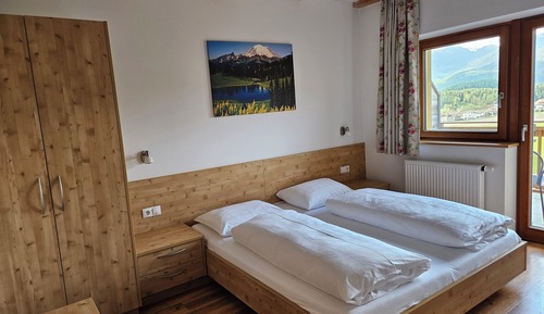 Habitación Confort con 1 cama doble o 2 individuales, 1 cama de matrimonio con sofá cama