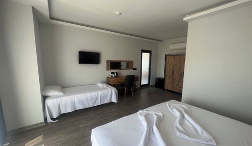 Habitación triple estándar, vistas al jardín