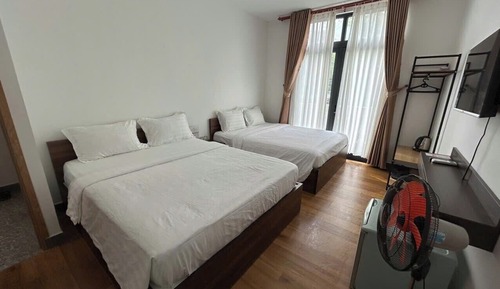 Habitación básica doble, 2 camas de matrimonio, vistas a la ciudad