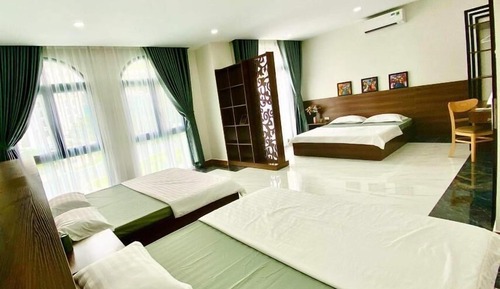 Habitación triple básica, varias camas, vistas a la ciudad