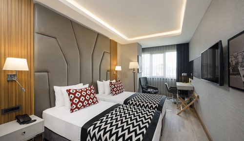 Habitación Deluxe, 1 cama de matrimonio grande con sofá cama, vistas a la ciudad (Balcony)