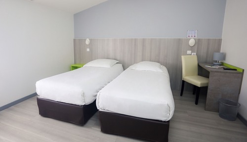 Habitación con 2 camas individuales