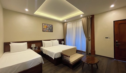 Habitación triple Deluxe, vistas al jardín