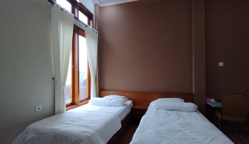 Habitación estándar con 1 cama doble o 2 individuales