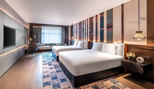Habitación Premium, varias camas