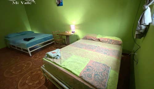 Habitación básica doble, varias camas