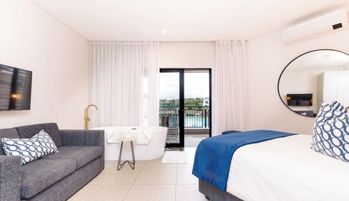 Suite estudio ejecutiva, 1 cama de matrimonio con sofá cama, no fumadores, vistas a la laguna