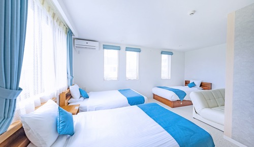 Habitación triple Deluxe