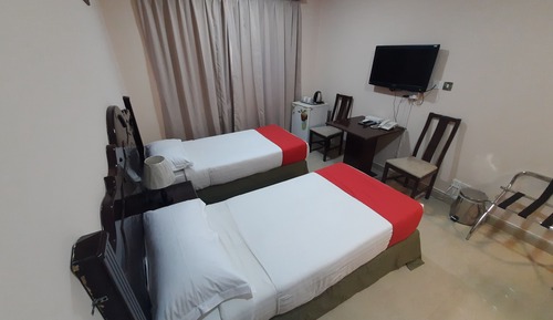 Habitación estándar con 1 cama doble o 2 individuales
