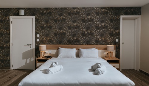 Habitación superior con 1 cama doble o 2 individuales, vistas a la ciudad