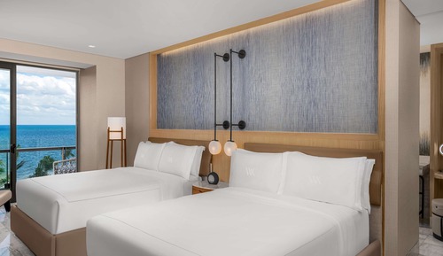 Suite, 2 camas de matrimonio, frente al mar
