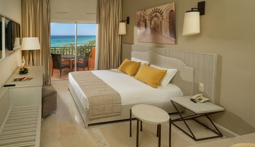 Habitación triple, vistas al mar
