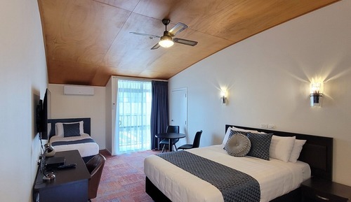 Habitación triple ejecutiva, varias camas