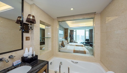 Habitación Business con 2 camas individuales, varias camas