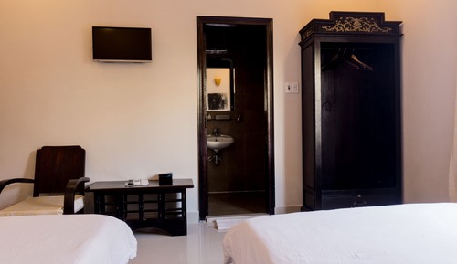Habitación Deluxe doble, varias camas, bañera, vistas a la ciudad