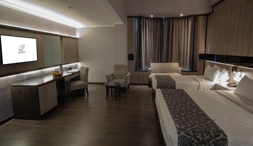 Habitación triple Deluxe