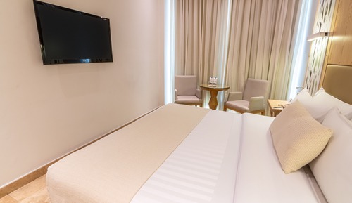 Habitación superior con 1 cama doble o 2 individuales