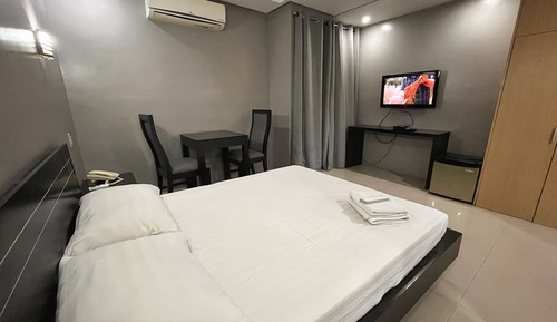 Habitación Deluxe, 1 cama de matrimonio, frigorífico, vistas al jardín