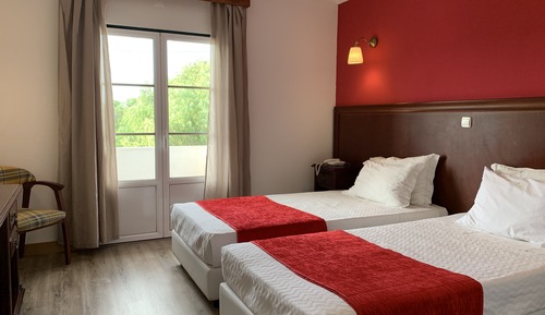 Habitación estándar con 1 cama doble o 2 individuales