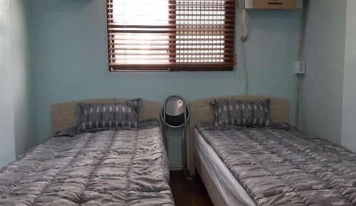 Habitación con 2 camas individuales
