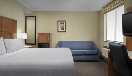 Habitación estándar, 1 cama de matrimonio grande con sofá cama