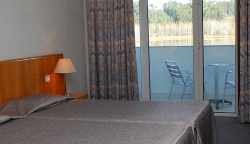 Habitación estándar, 1 cama doble o 2 individuales, balcón, vistas al lago