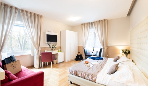 Habitación Deluxe doble, vistas al río (Breakfast at Navona Street Hotel)