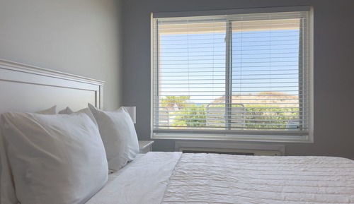 Suite, varias camas, cocina, vistas al mar