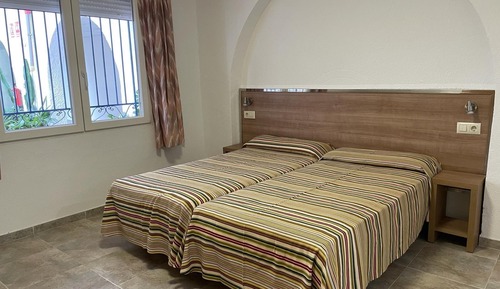 Habitación superior con 1 cama doble o 2 individuales