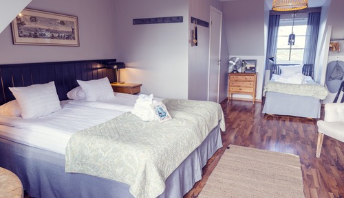Habitación triple con vistas al campo