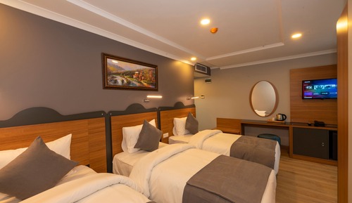 Habitación triple Deluxe