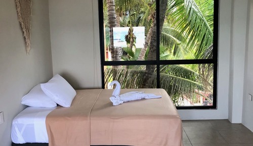 Habitación cuádruple Deluxe, 2 camas de matrimonio