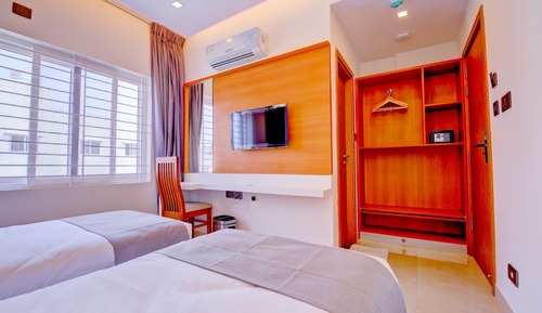 Habitación Deluxe con 2 camas individuales, varias camas