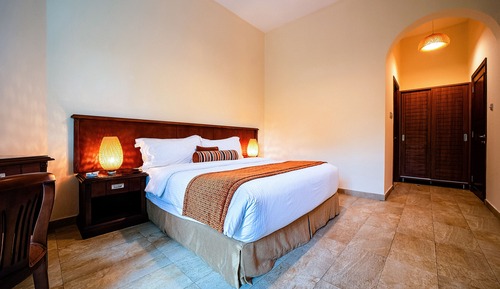 Habitación ejecutiva, 1 cama de matrimonio grande, vistas al jardín, en la zona del jardín