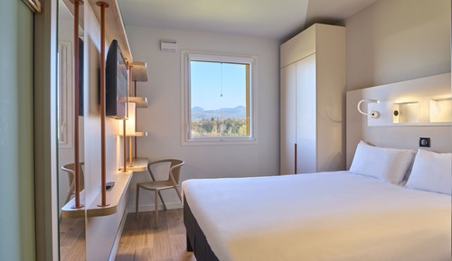 Habitación triple, varias camas