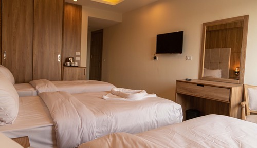 Trible Room with Garden View